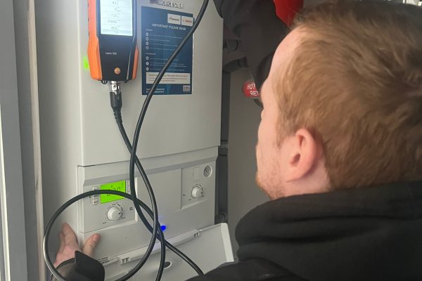 Alfie servicing a boiler - training